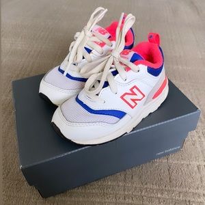 New balance toddler/infant sneakers, size 7. White, pink and blue. Unisex, Used